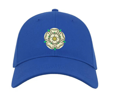 A royal blue baseball cap featuring a small embroidered rose of England on the front, set against a plain white background.